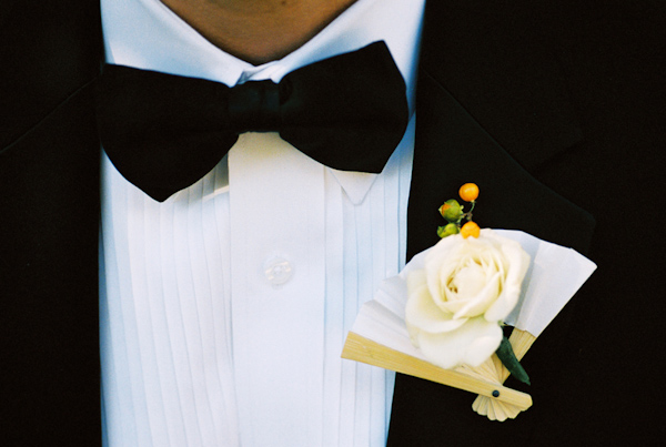 wedding rose and fan boutonniere photo by Yvette Roman Photography